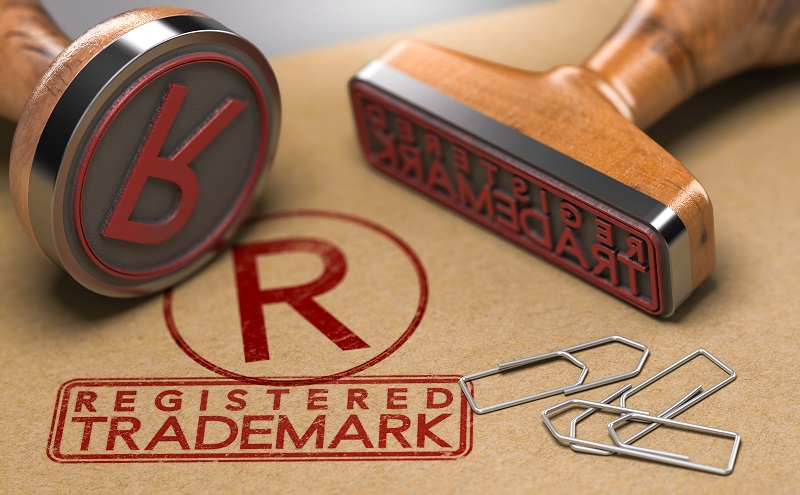 a close-up of a stamp. Containing the words: b r registered trademark