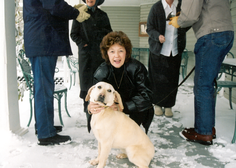 Secretary Marshall petting a plott hound