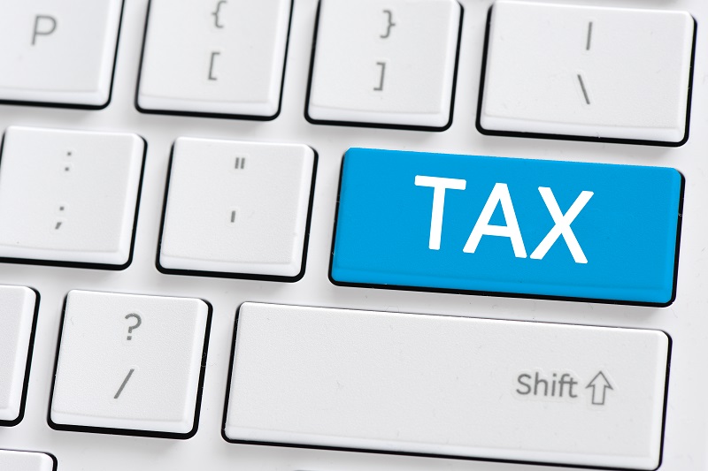 THe word Tax on a keyboard