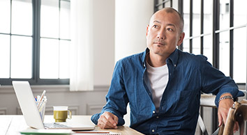 a person sitting at a table.